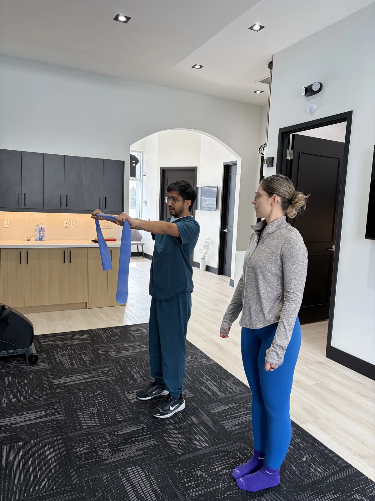 Shoulder rehabilitation exercise after a car accident at Interlink Physiotherapy in Ancaster